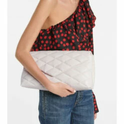 Best reviews of 👏 Saint Laurent Sade Puffer Quilted Leather Clutch 💯